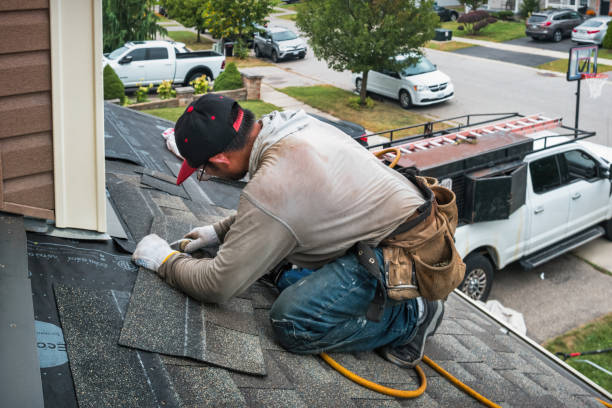 Professional Roofing technician working in Hurley, NY